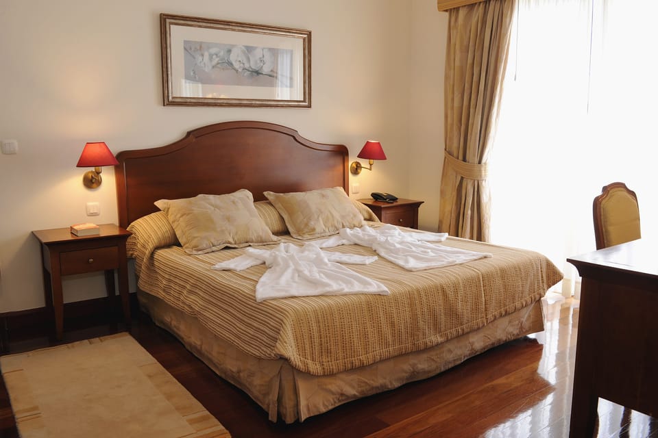 Junior Suite, Sea View | Minibar, desk, blackout drapes, soundproofing