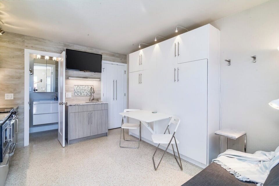 Murphy bed adding additional space during the day