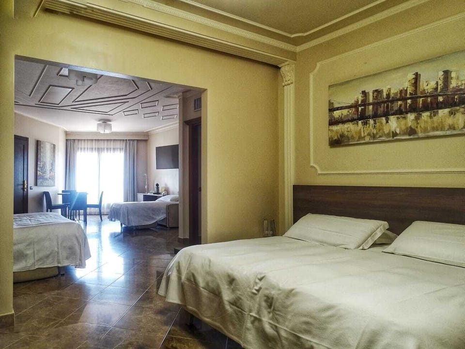 Classic Quadruple Room | Premium bedding, down comforters, pillowtop beds, minibar
