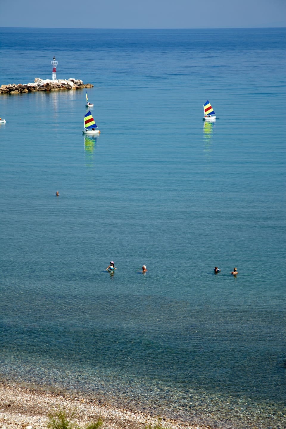 On the beach, sun loungers, beach umbrellas, beach towels