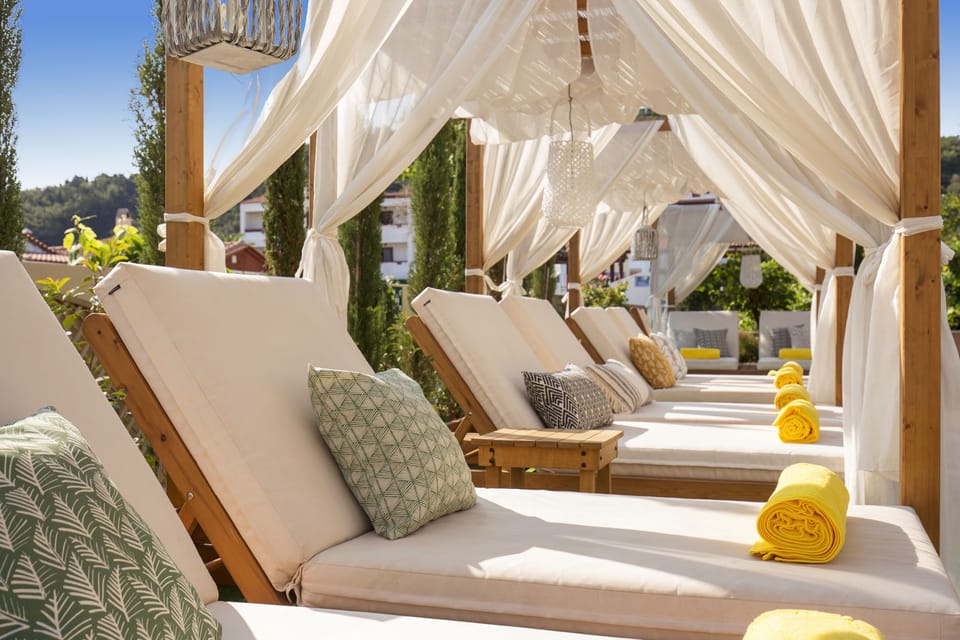 2 outdoor pools, open 9 AM to 6:30 PM, pool umbrellas, sun loungers