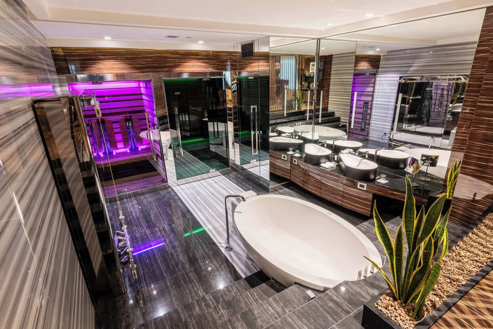 Double Room | Bathroom | Designer toiletries, hair dryer, bathrobes, slippers