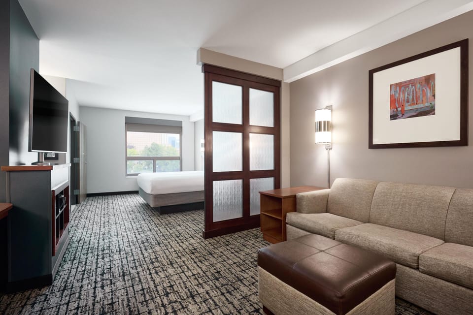 Hypo-allergenic bedding, down comforters, desk, laptop workspace