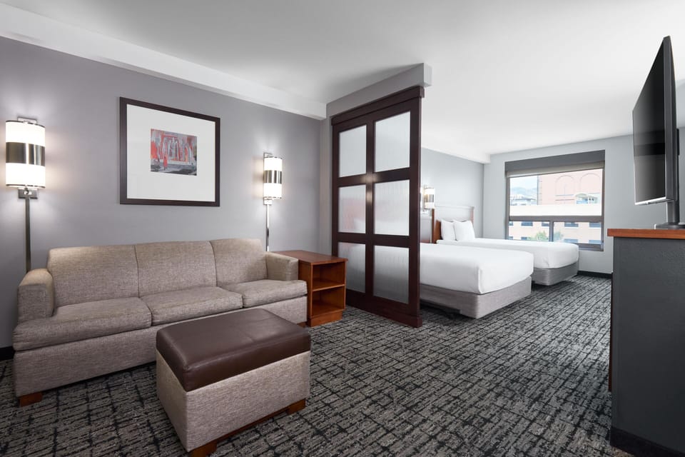 Hypo-allergenic bedding, down comforters, desk, laptop workspace