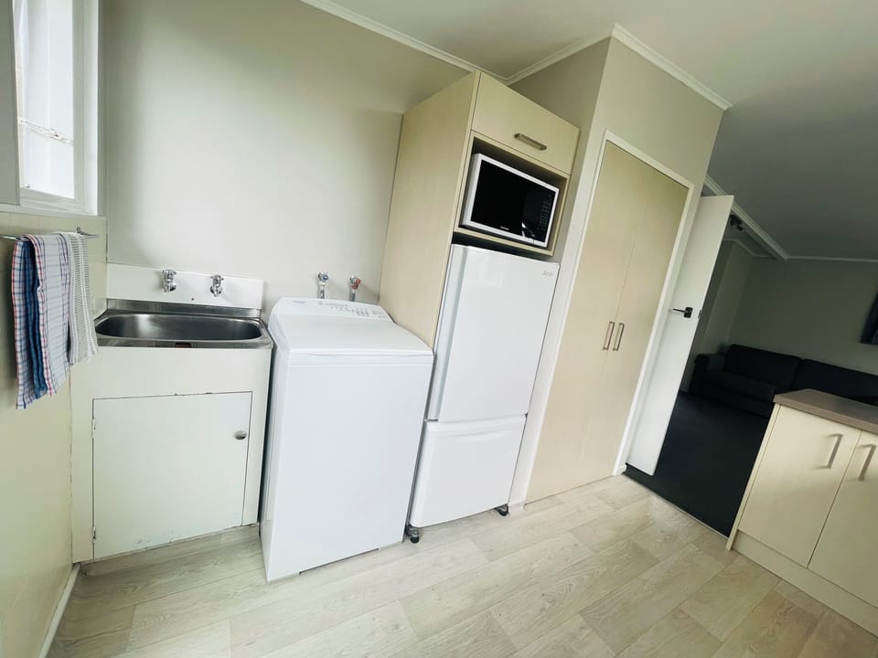 Superior Two Bedroom Apartment 1 | Laundry