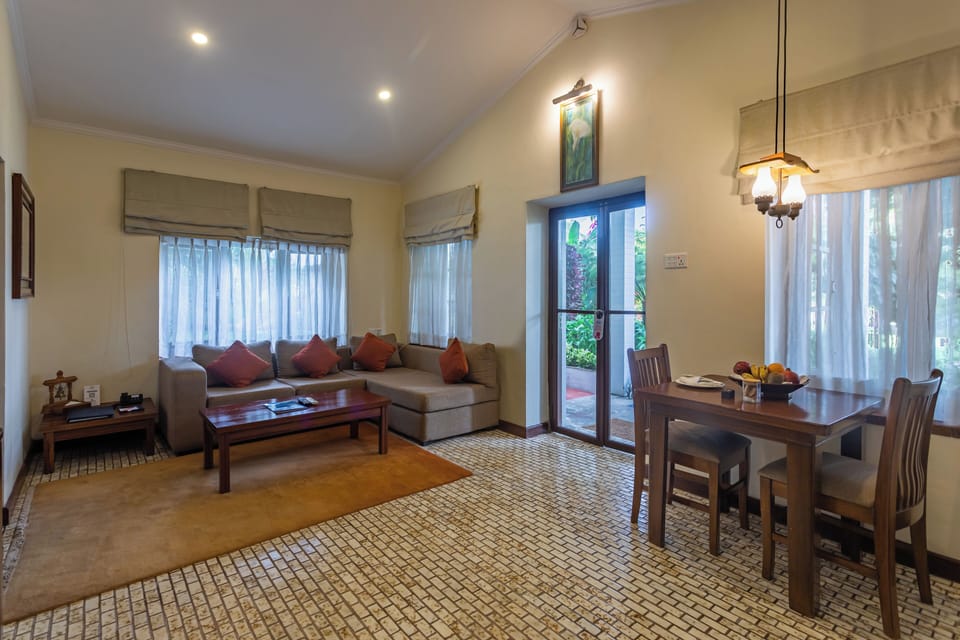 Heritage Suite | Living area | 30-inch LCD TV with cable channels, TV, table tennis