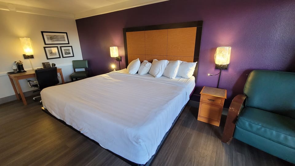 Pillowtop beds, desk, blackout drapes, iron/ironing board