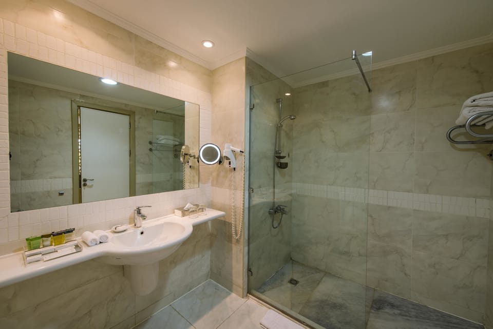 Shower, free toiletries, hair dryer, bathrobes