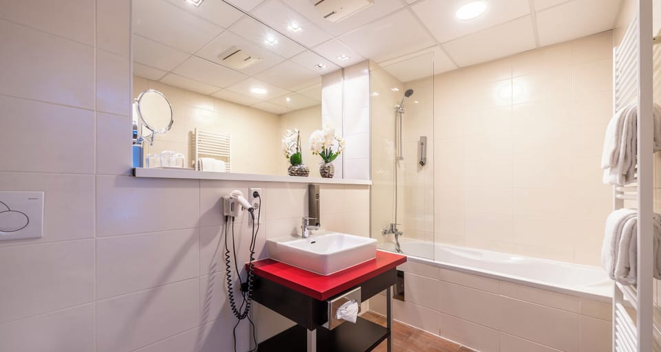 Triple Room | Bathroom | Bathtub, deep soaking tub, hair dryer, towels