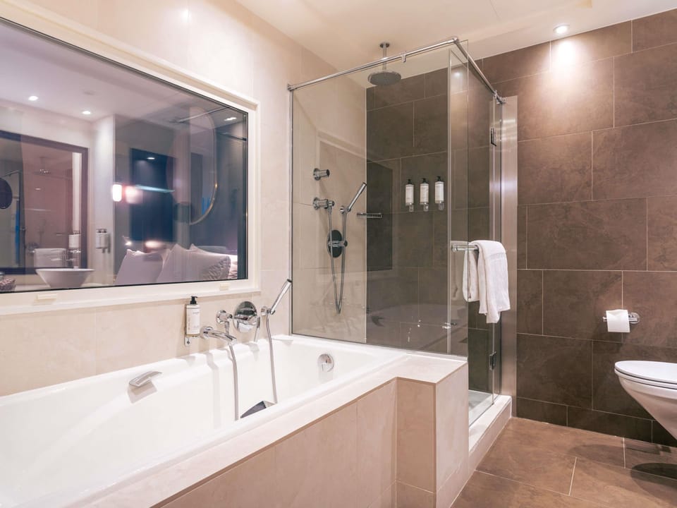 Premium bedding, pillowtop beds, free minibar items, in-room safe