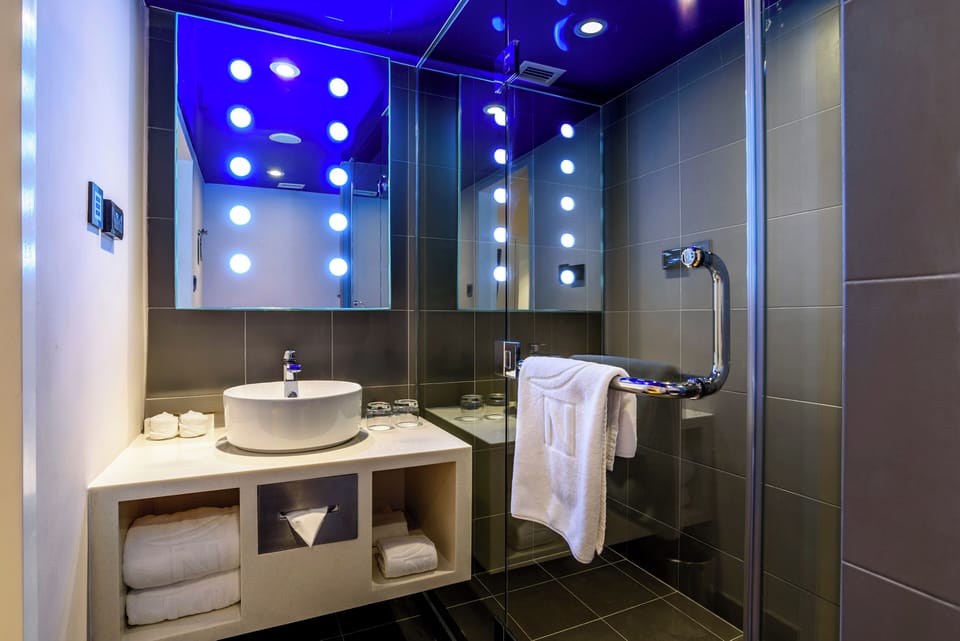 Eco-friendly toiletries, hair dryer, bathrobes, bidet