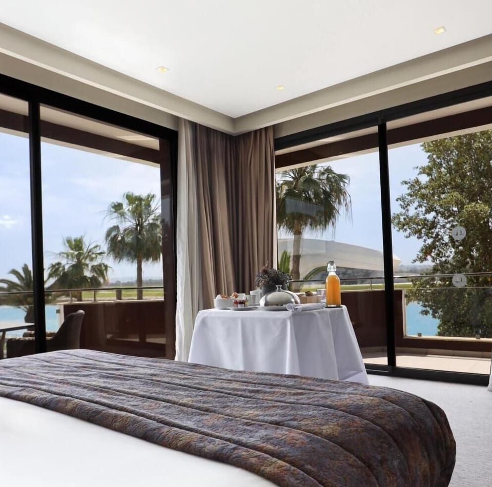 Premium Suite (River View) | Minibar, in-room safe, individually decorated, individually furnished