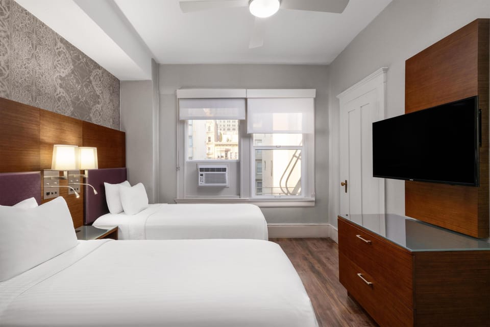Standard Room, Multiple Beds, Non Smoking | Premium bedding, desk, laptop workspace, blackout drapes