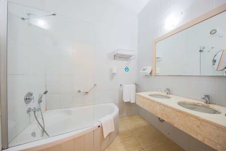 Free toiletries, hair dryer, slippers, towels