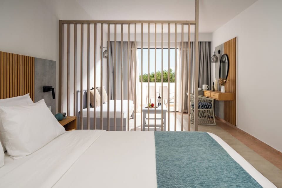 Double Room, Garden View | In-room safe, blackout drapes, free WiFi, bed sheets