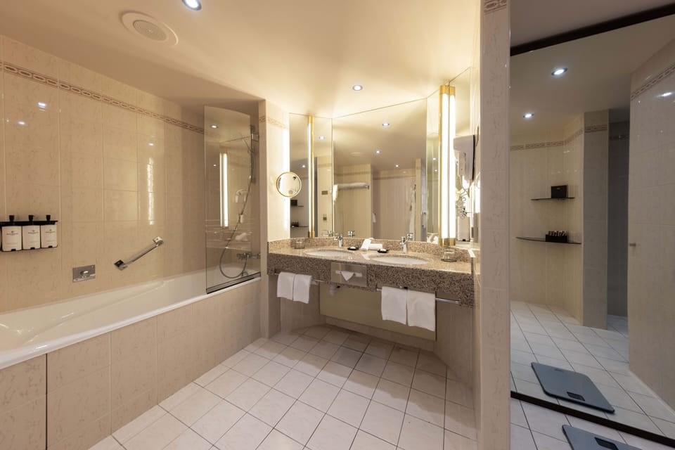 Suite, 1 Double Bed, River View | Bathroom | Designer toiletries, hair dryer, bathrobes, slippers