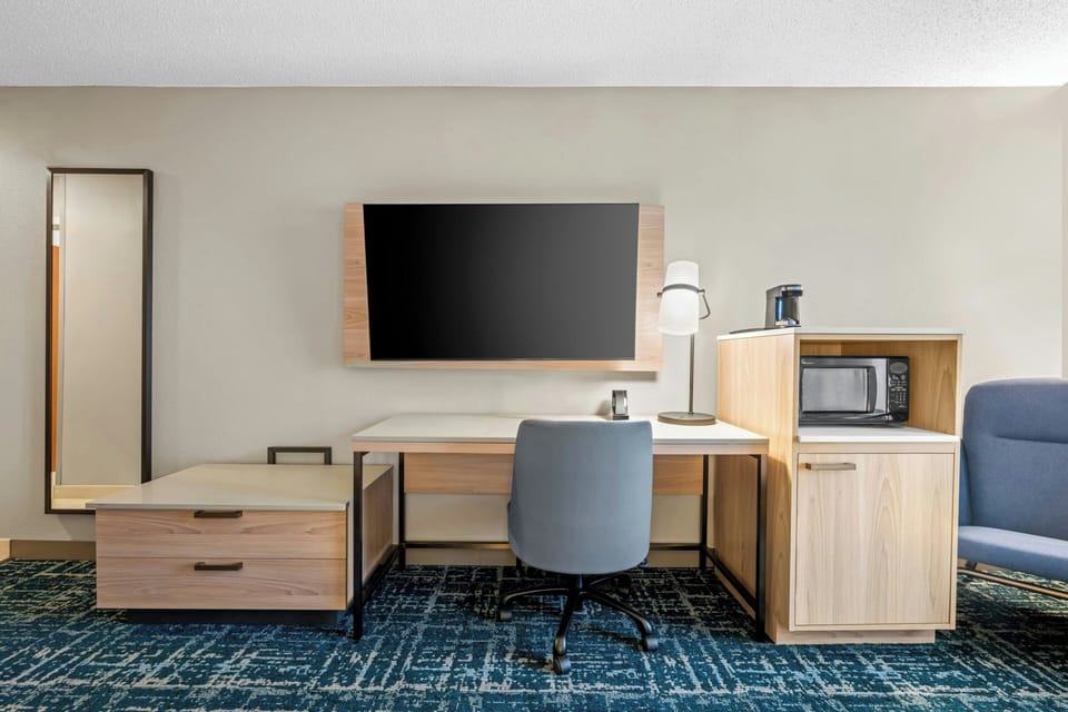 Premium bedding, memory foam beds, desk, blackout drapes