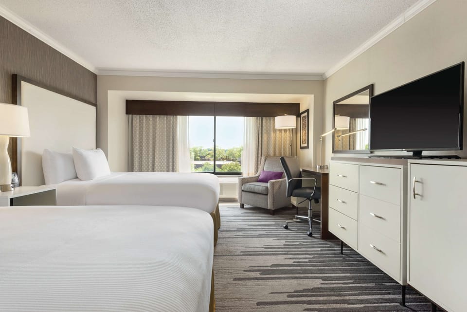 Two Double Beds | Premium bedding, in-room safe, desk, blackout drapes