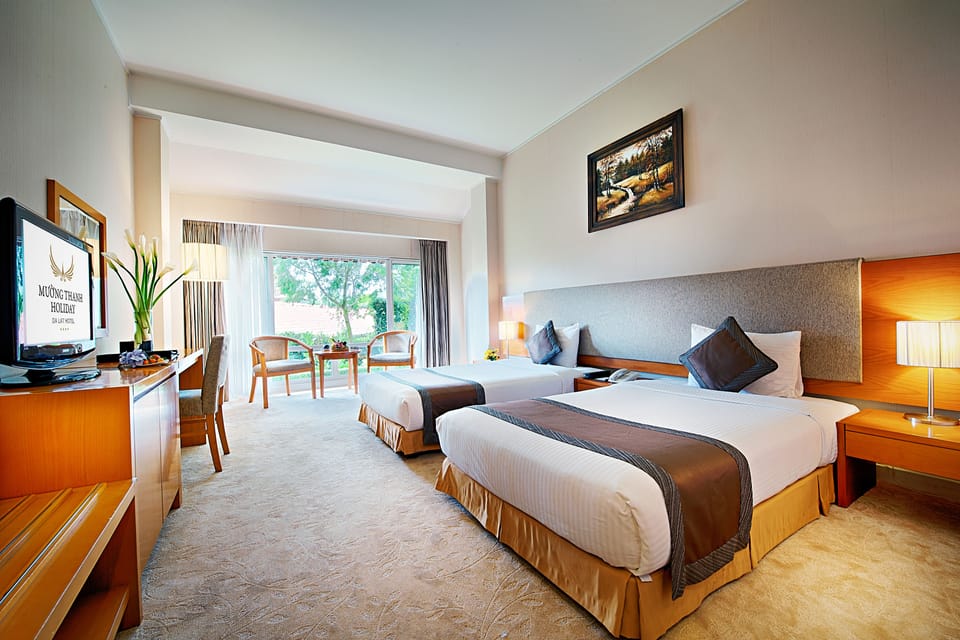 Superior Twin Room | Minibar, in-room safe, desk, blackout drapes
