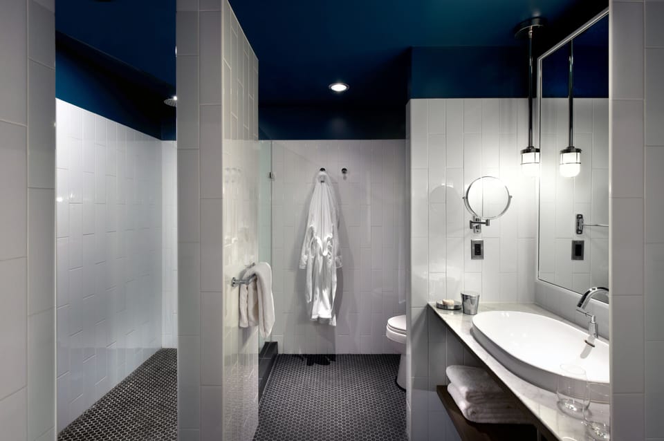 Shower, hydromassage showerhead, designer toiletries, hair dryer