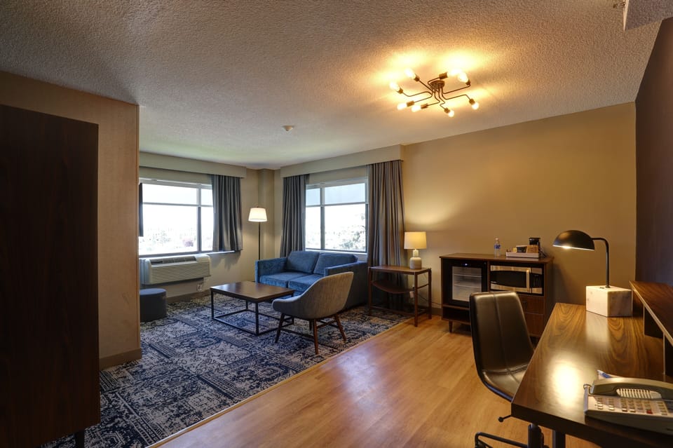 Junior Suite, 1 King Bed with Sofa bed | Living area | 42-inch LED TV with cable channels, TV