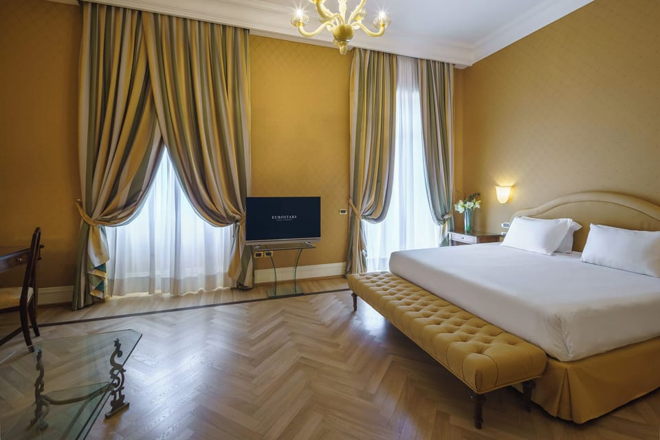 Premium bedding, down comforters, minibar, in-room safe