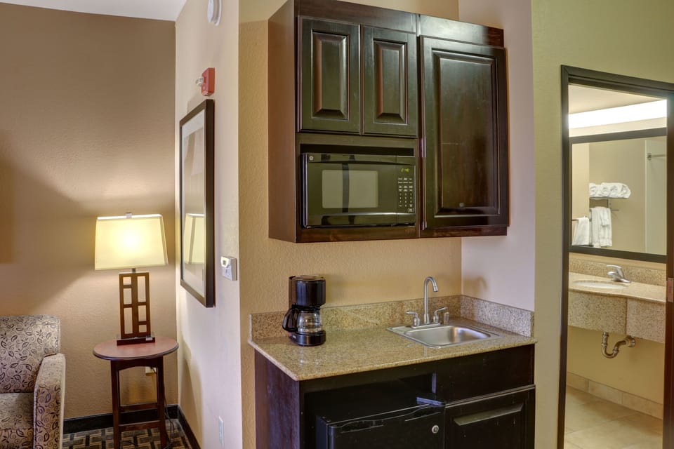 Suite, Multiple Beds | In-room safe, desk, iron/ironing board, free cribs/infant beds