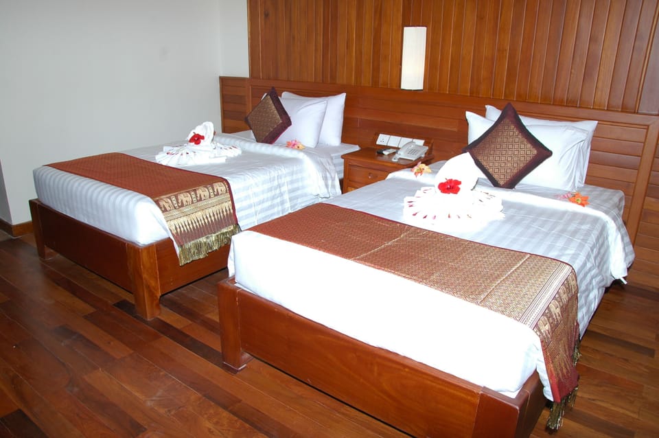 Premium bedding, pillowtop beds, minibar, in-room safe