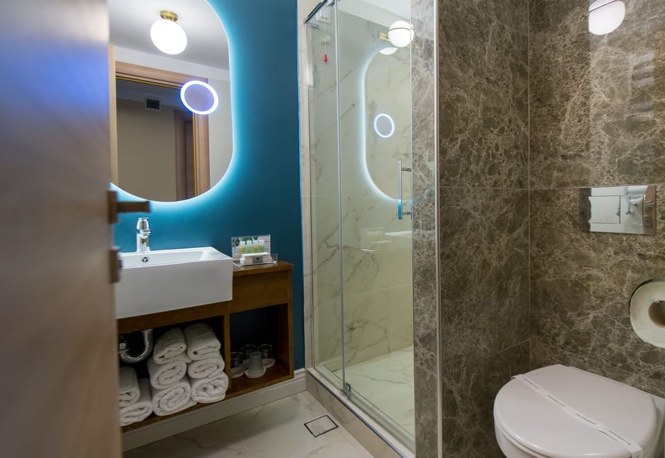 Shower, free toiletries, hair dryer, bathrobes