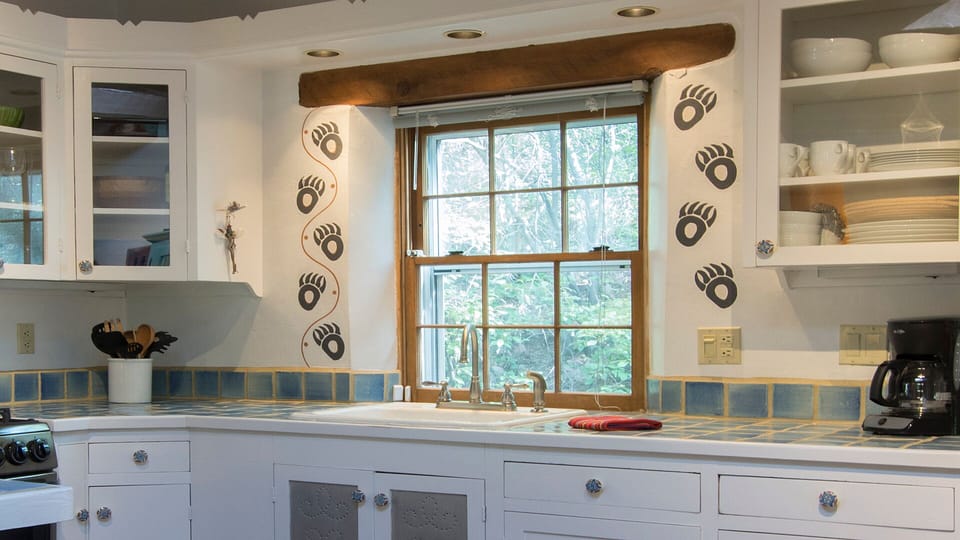 Kitchen supplied with all of your needs...dishes, cookware, organic coffee