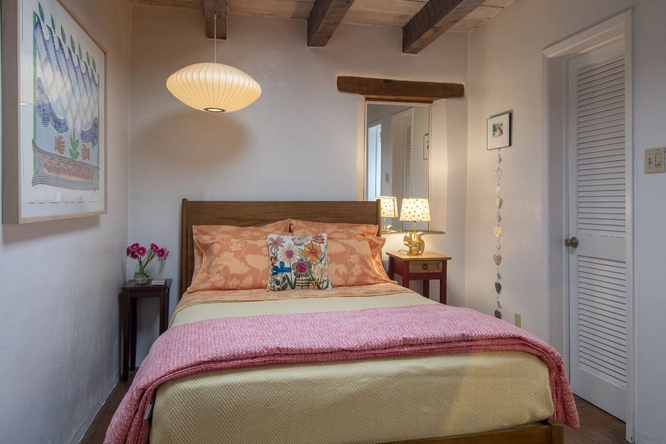Sweet queen bedroom with closet and washer/dryer