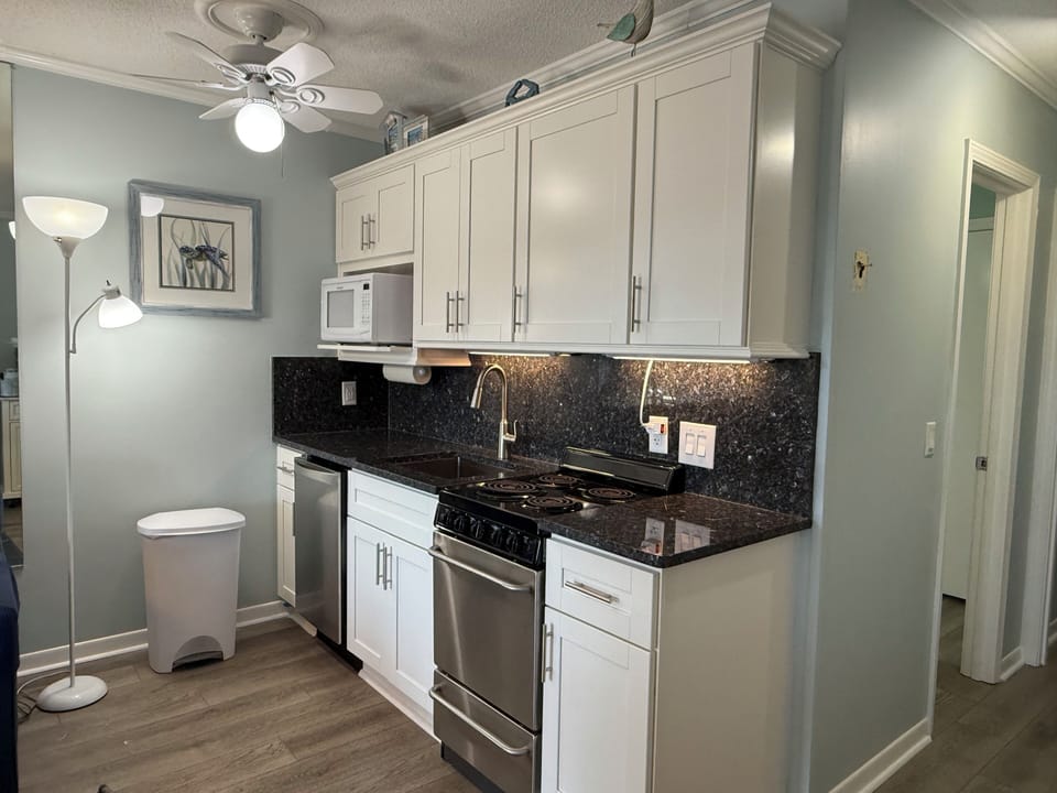 New kitchenette 2025 granite countertops. Everything you need to prepare a meal.