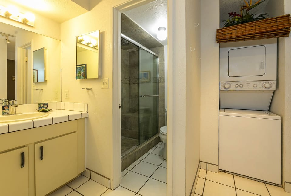 Bathroom with Washer and Dryer for Your Convenience 