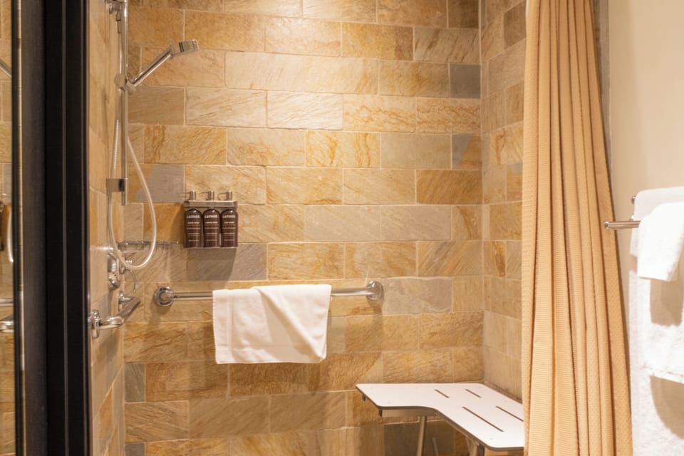 Combined shower/tub, free toiletries, hair dryer, bathrobes