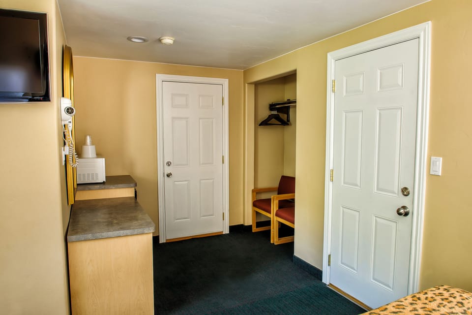 Blackout drapes, iron/ironing board, cribs/infant beds, rollaway beds