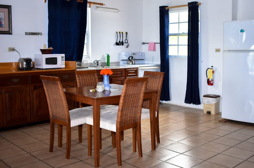 Cottage, 1 Queen Bed with Sofa bed, Balcony, Beach View (Admiral's) | Private kitchenette | Coffee/tea maker, fridge