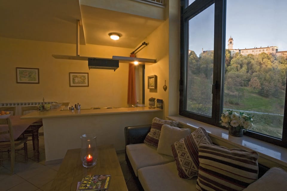 Apartment, 2 Bedrooms (OLTRE) | Living area | Flat-screen TV