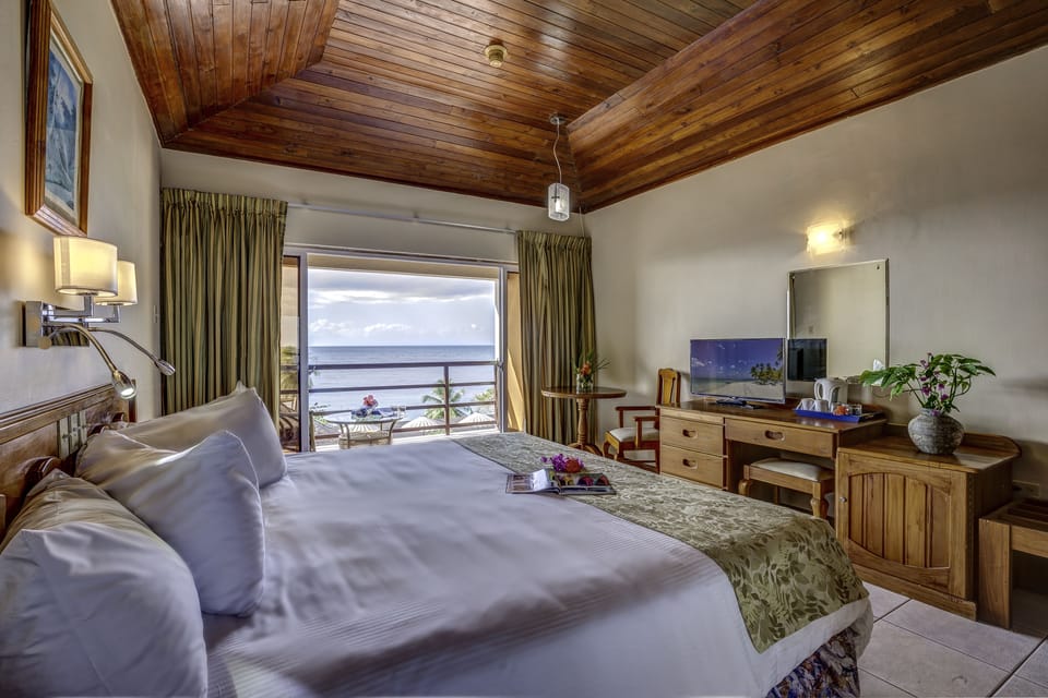Standard Room, 1 King Bed, Ocean View | Select Comfort beds, in-room safe, desk, iron/ironing board (on request)