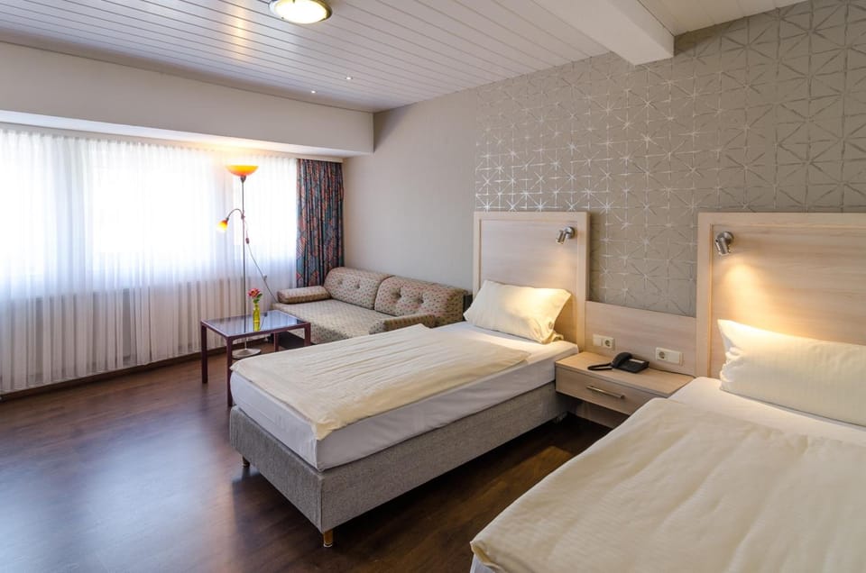 Minibar, desk, WiFi (free), bed sheets
