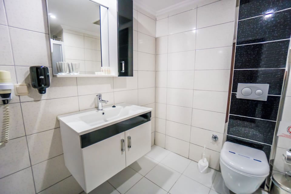 Shower, free toiletries, hair dryer, towels