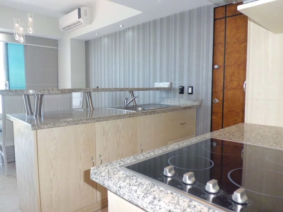 Family Condo, 2 Bedrooms | Private kitchen | Full-size fridge, microwave, stovetop, coffee/tea maker