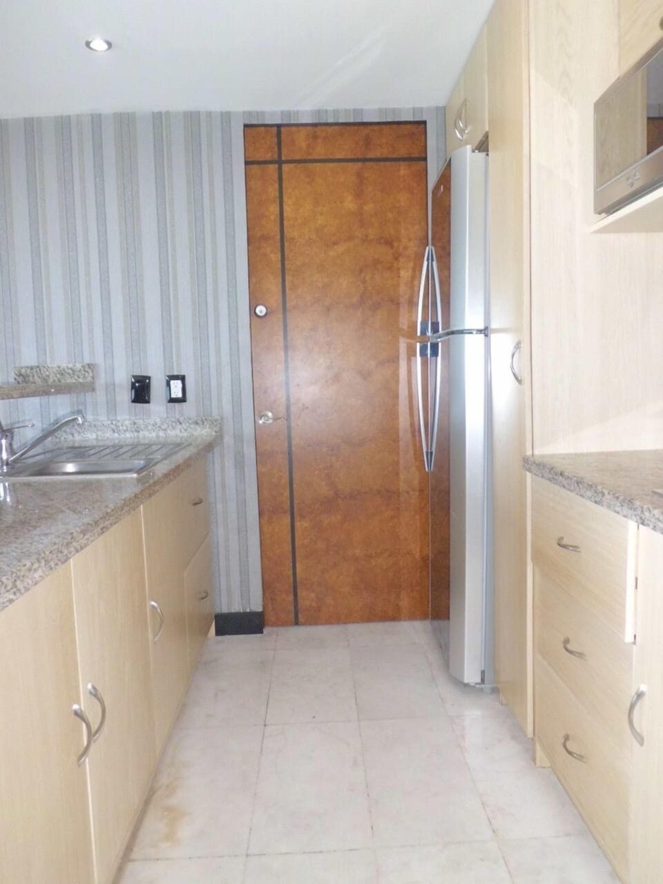 Family Condo, 2 Bedrooms | Private kitchen | Full-size fridge, microwave, stovetop, coffee/tea maker