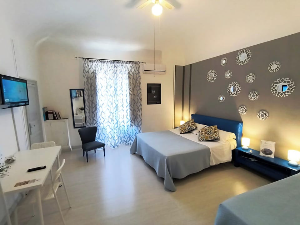 Premium bedding, down comforters, desk, laptop workspace