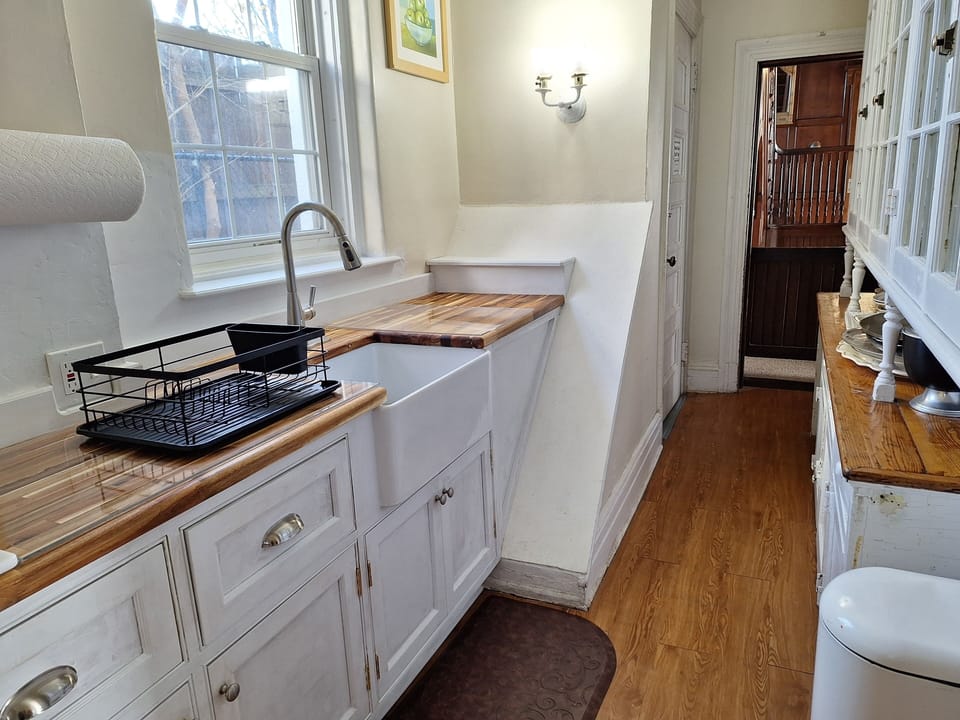 Dishwashing area with cupboards