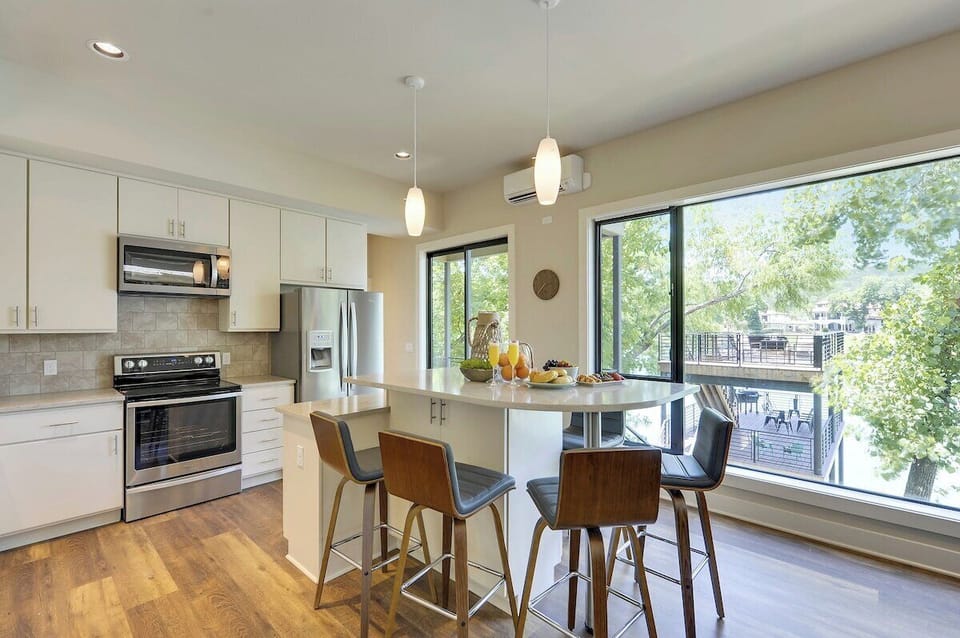 Dining Area + Kitchen - Walker Luxury Vacation Rentals