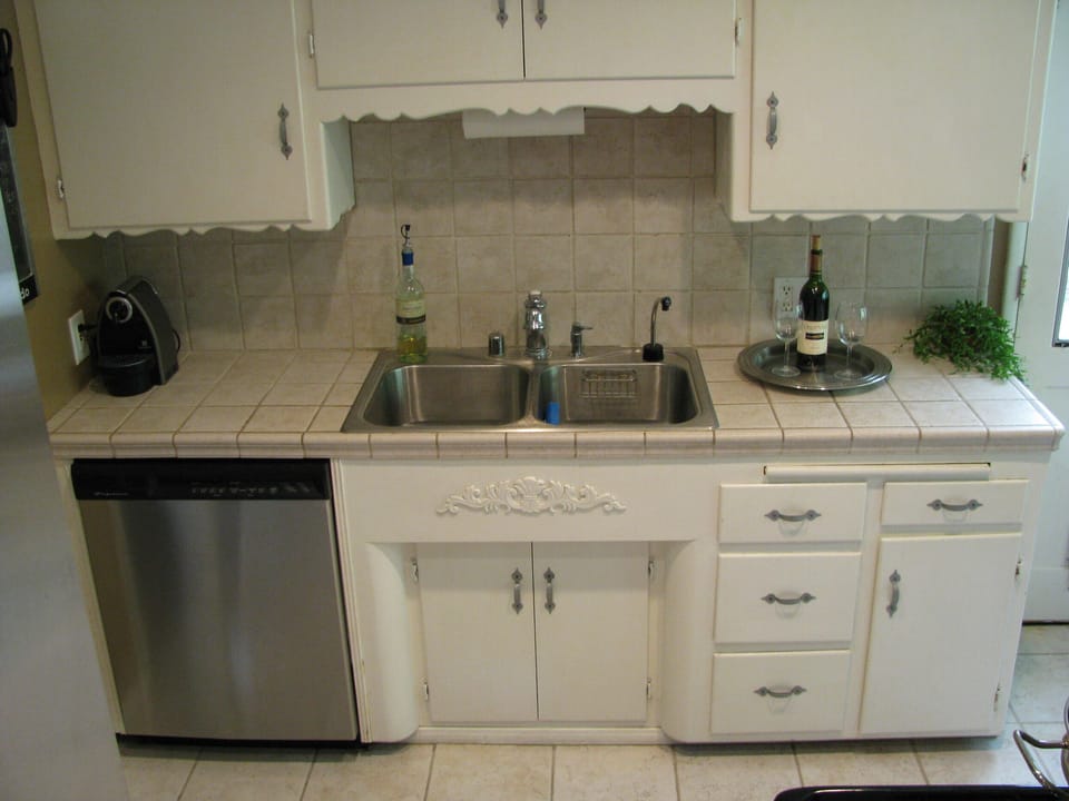 Kitchen has plenty of Dishes, Silverware, Glasses, Pots & Pans for Great Meals!