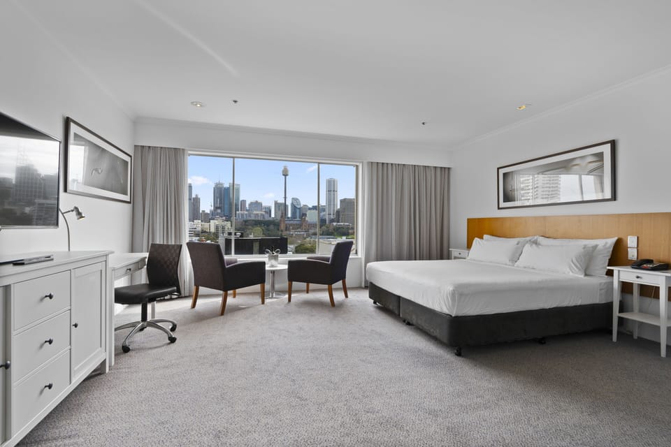 Suite, 1 King Bed, City View | Premium bedding, down comforters, Tempur-Pedic beds, in-room safe