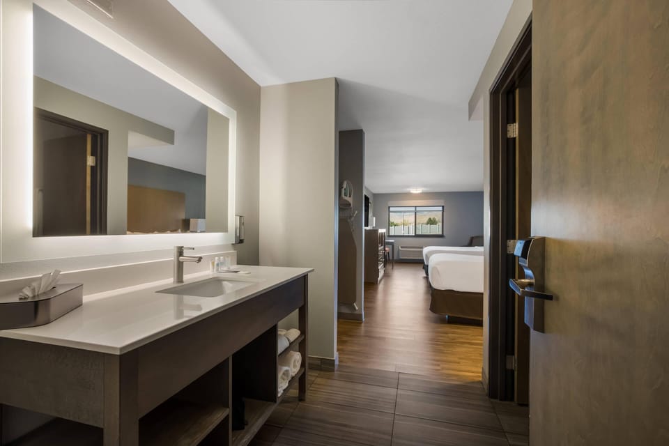 Standard Room, 2 Queen Beds, Non Smoking | Laptop workspace, blackout drapes, iron/ironing board