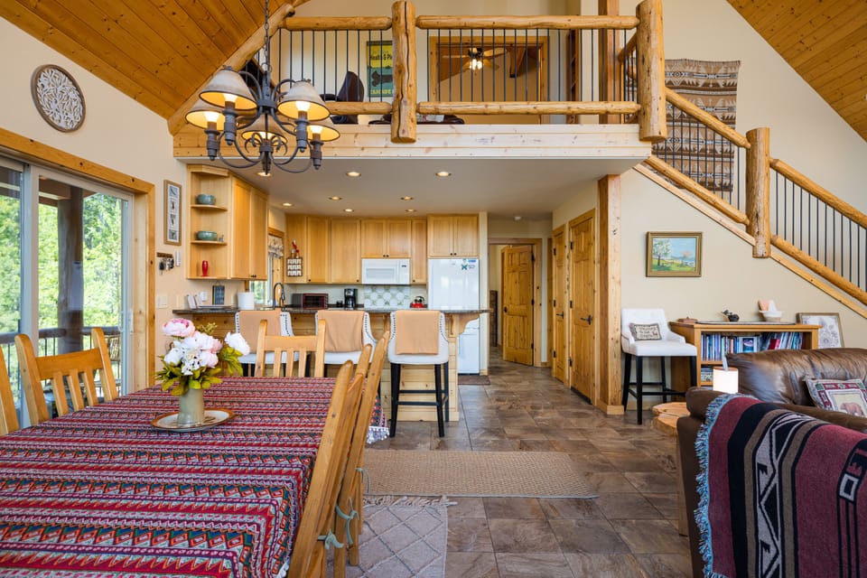 Dining room and kitchen with loft above