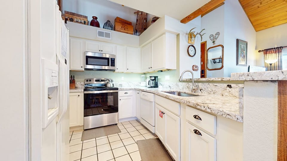 Condo, 2 Bedrooms | Private kitchen | Fridge, microwave, dishwasher, coffee/tea maker